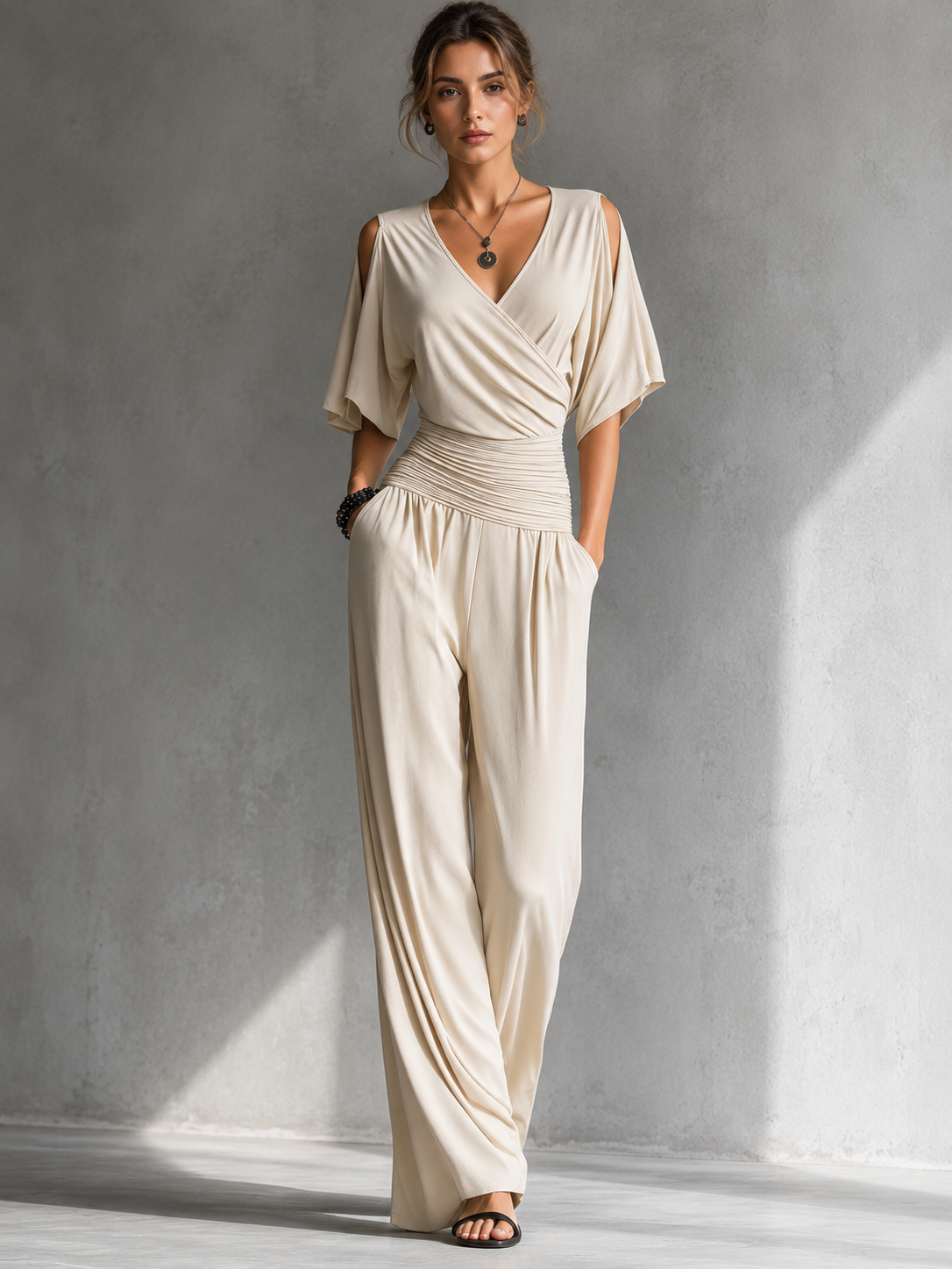 Gerika – Elegant jumpsuit med slå-om-front